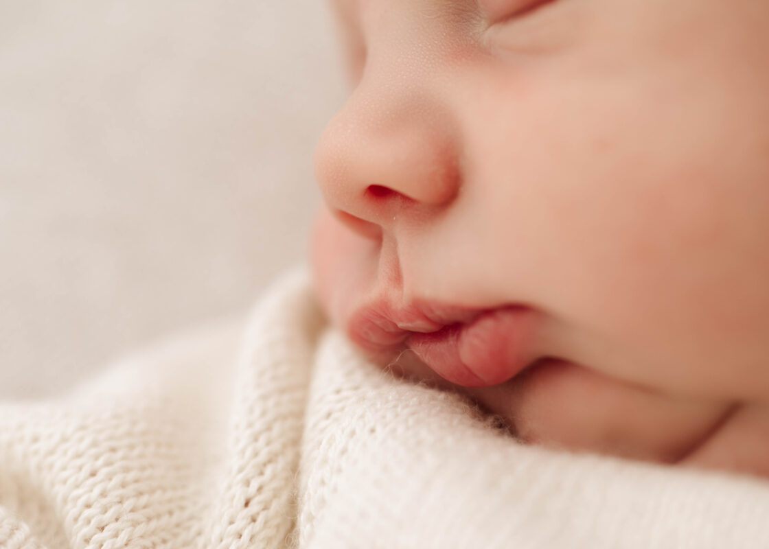 macro image of a newborn baby at photoshoot in NEW MALDEN