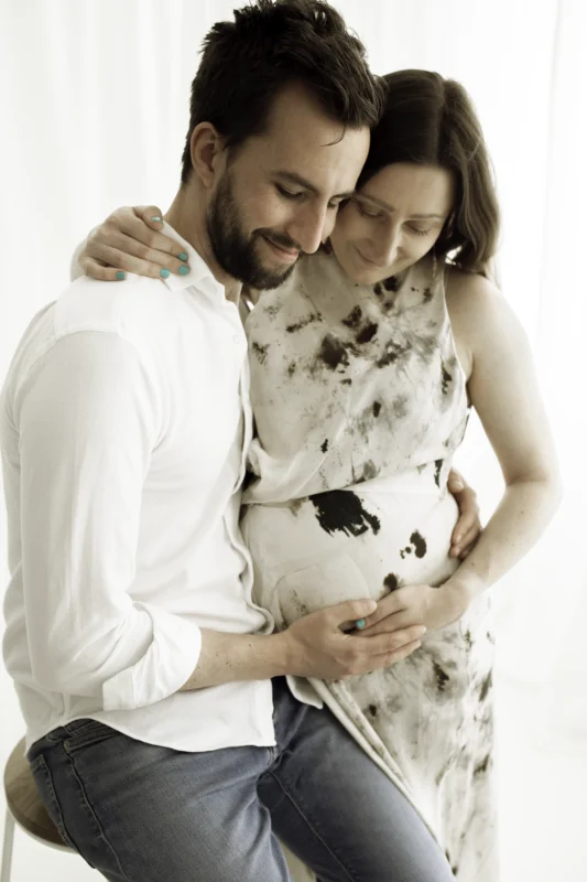 couple preparing for new baby at photoshoot in New Malden 