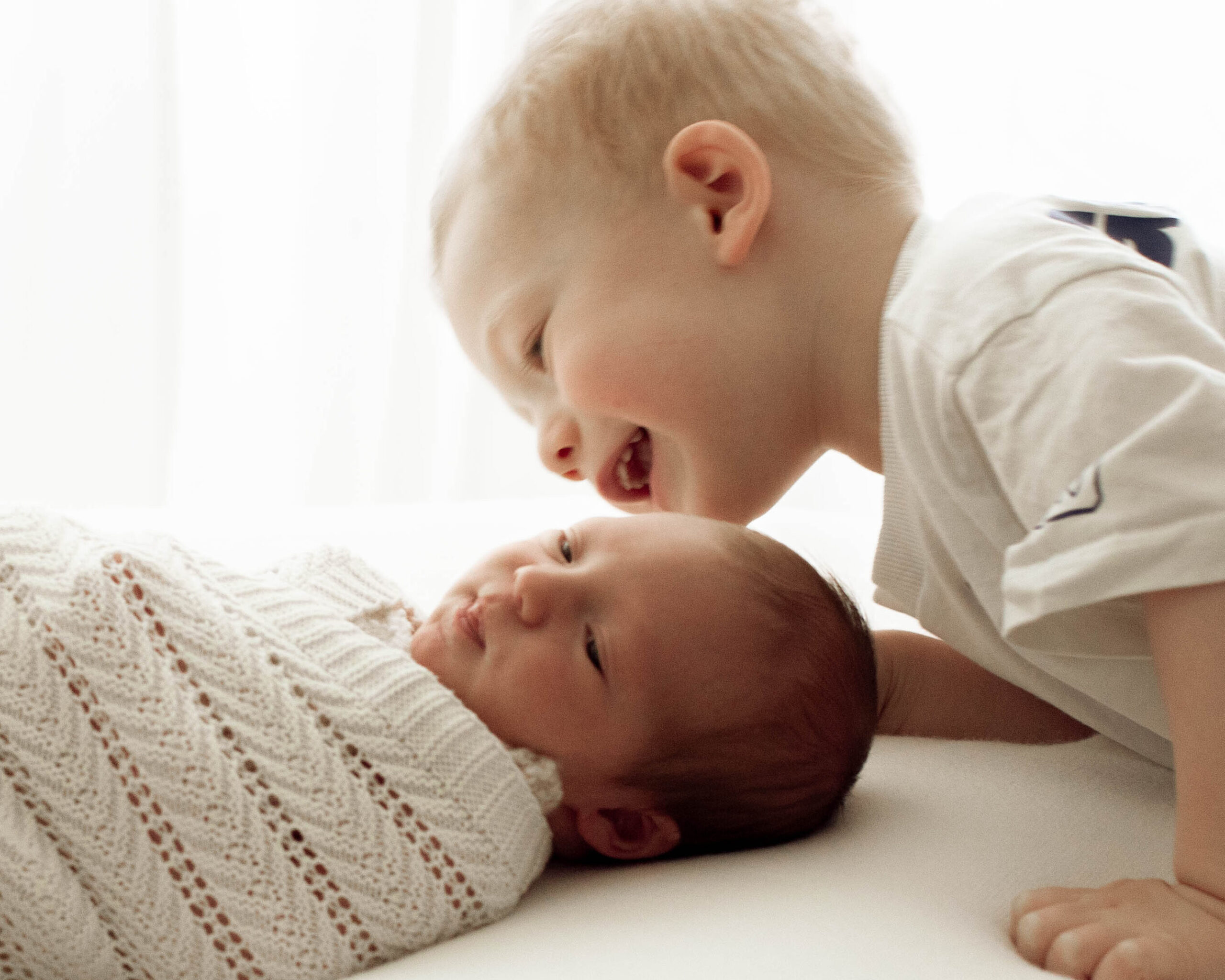 london baby photoshoot with brother