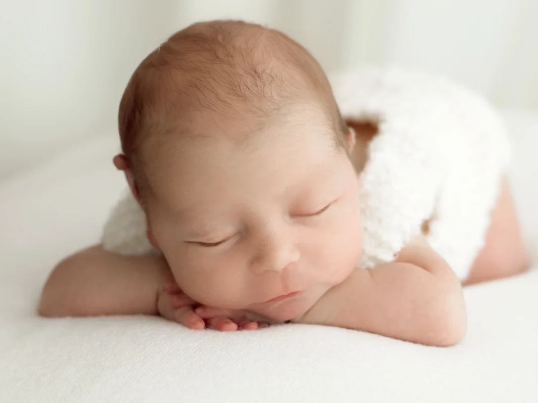 baby sleeping peacfully at photo taken by in studio by photographer