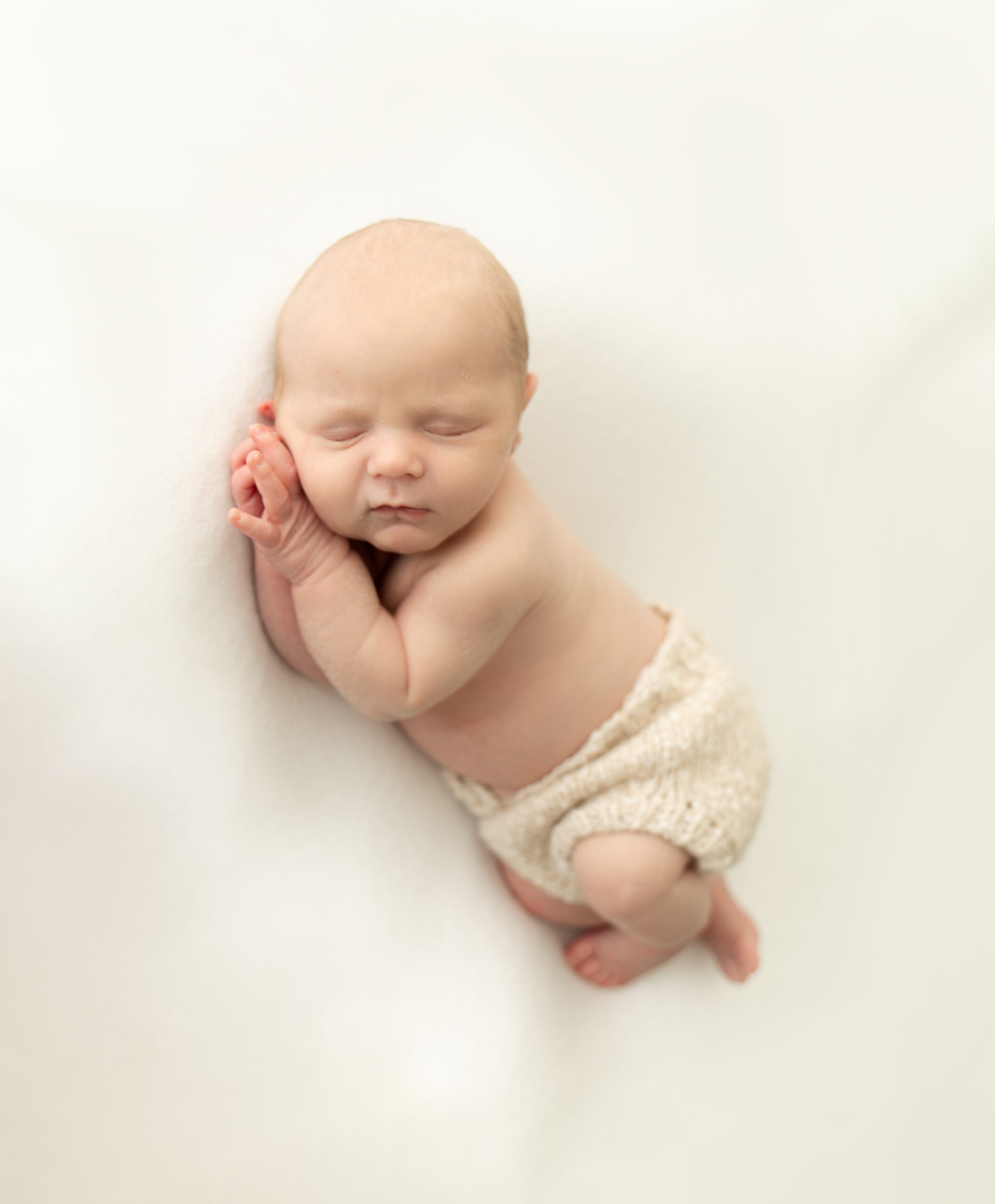 baby sleeping at newborn photoshoot in Kingston upon Thames